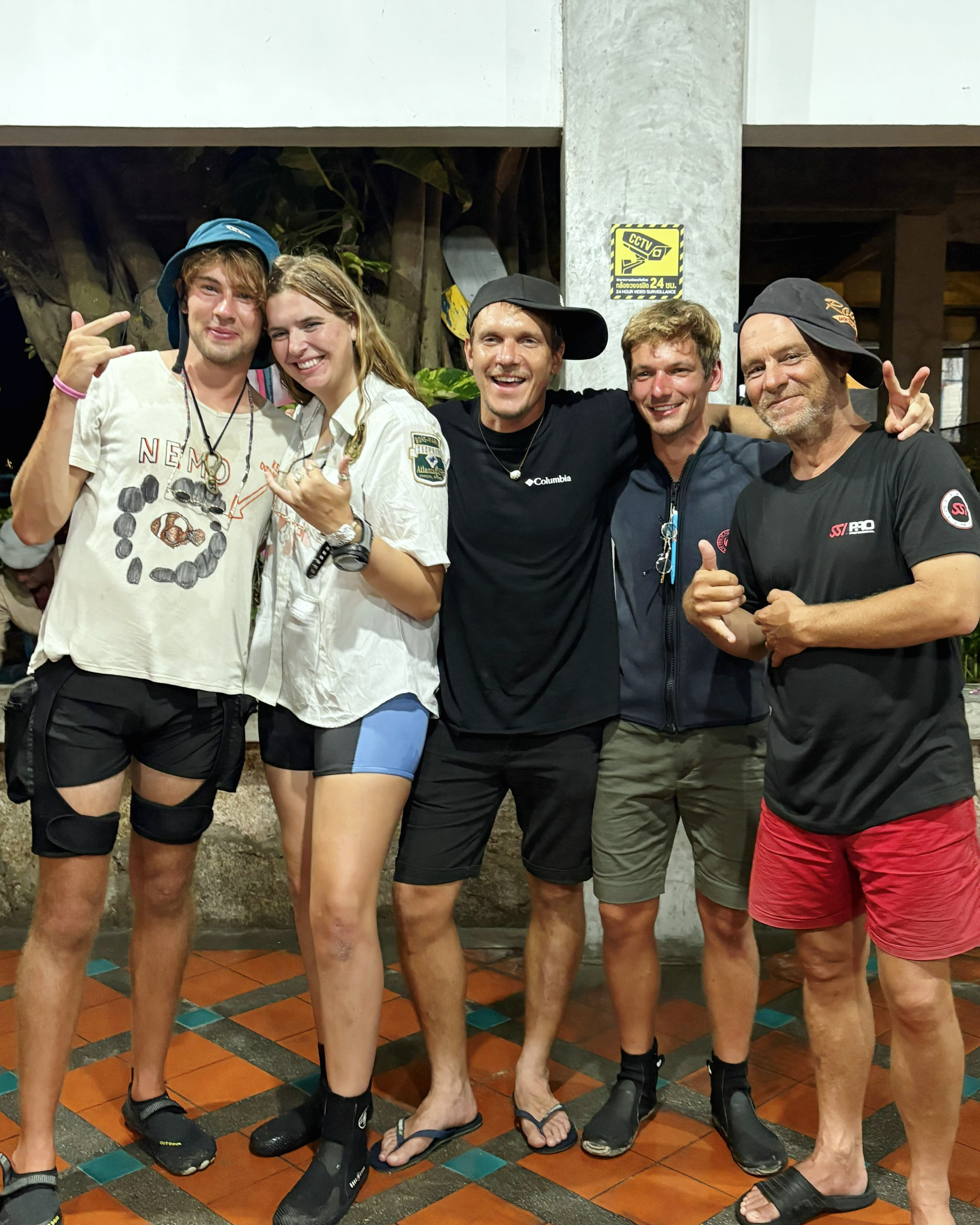 Luke, Jojo, and Matthew with instructors Rory and Steve — end of the divemaster snorkel test
