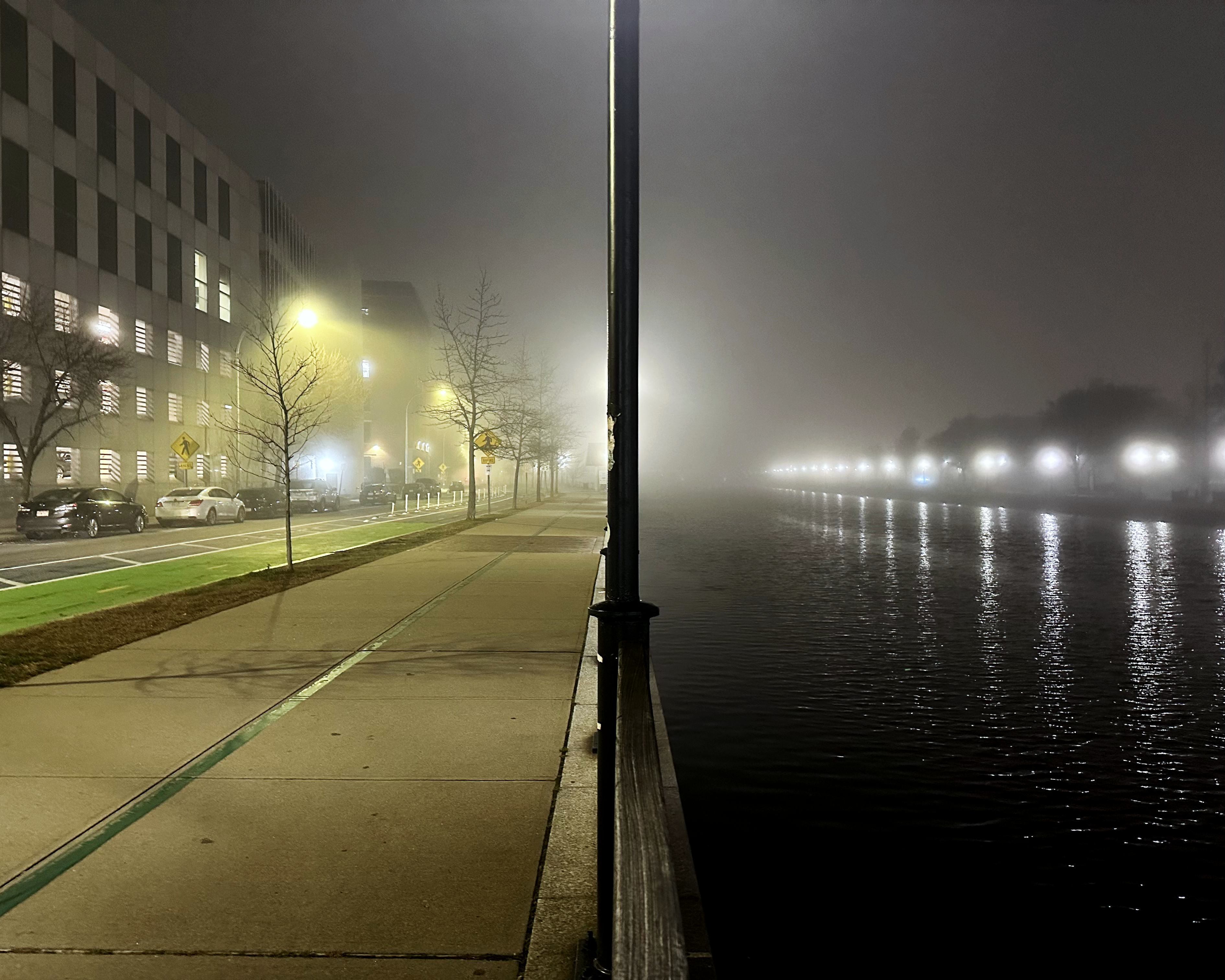Providence, Rhode Island — a lamppost divides the river between light and dark